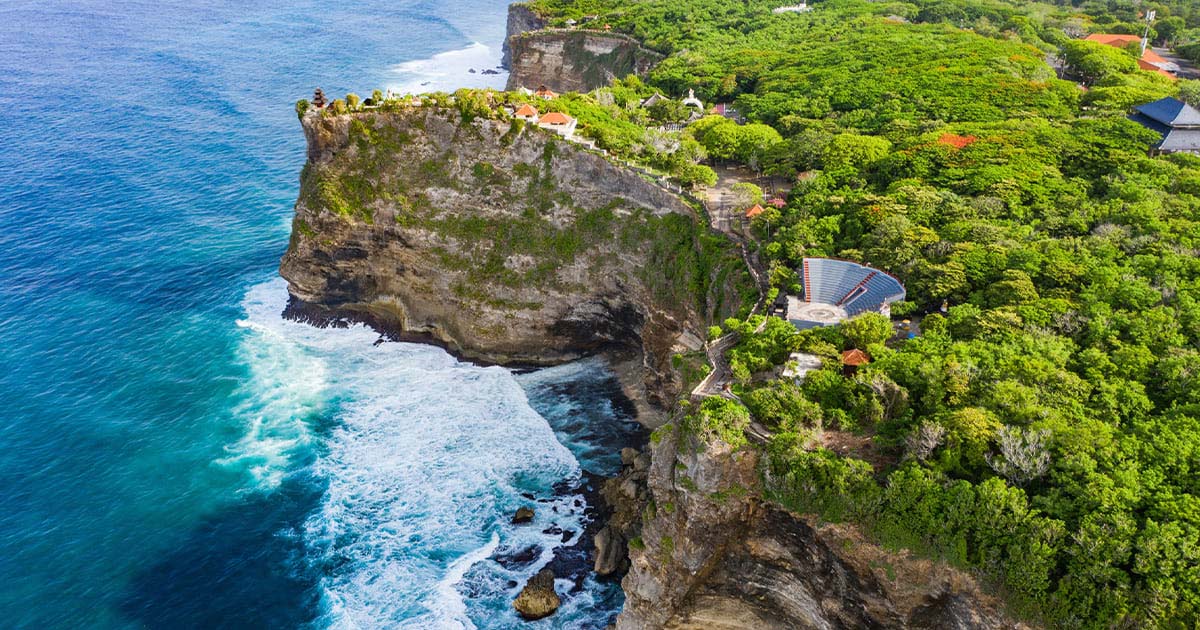 Aerial view of Bali coastline from helicopter, golden afternoon light